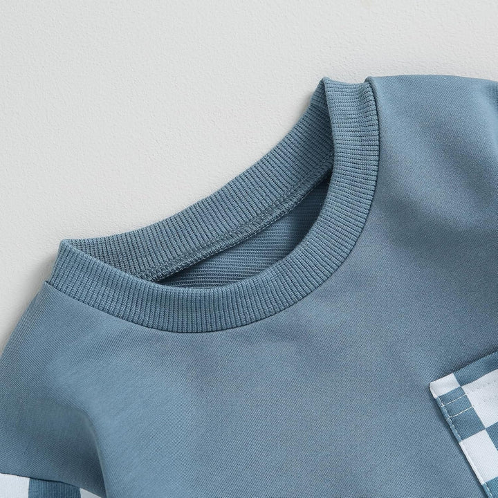 Blaues Kinder-T-Shirt aus Baumwolle mit Rundhalsausschnitt und kariertem Muster.