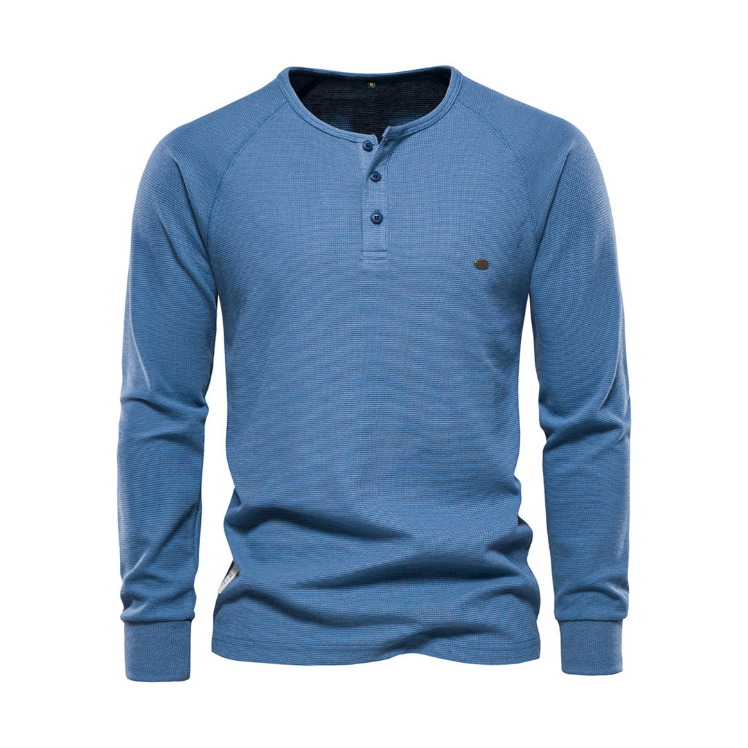 Blaues Herren-Henley-Shirt, Langarm, Baumwolle, Knopfleiste, Freizeitmode.