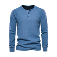 Blaues Herren-Henley-Shirt, Langarm, Baumwolle, Knopfleiste, Freizeitmode.