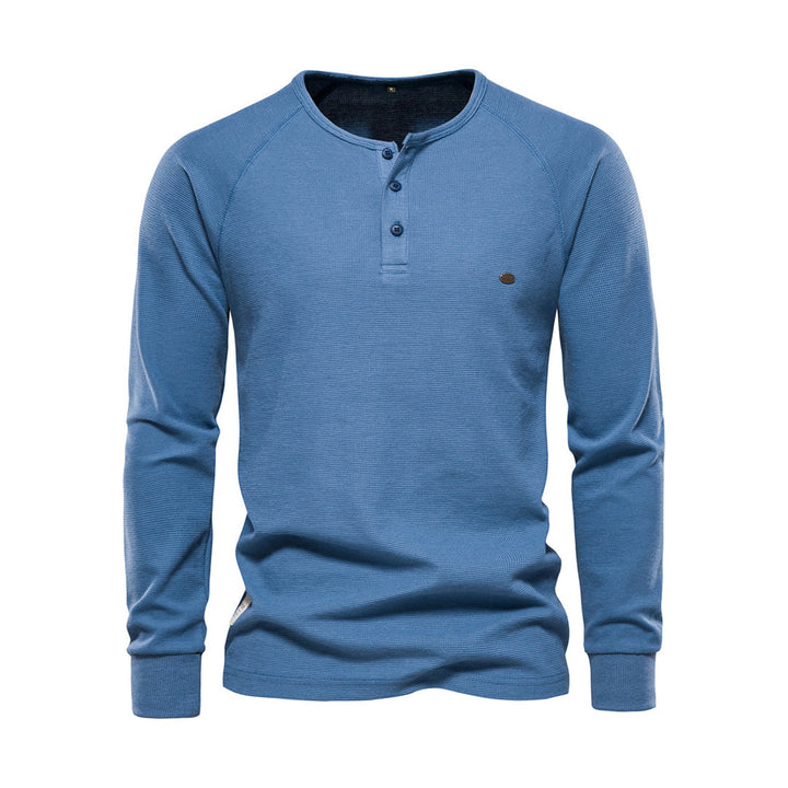 Blaues Herren-Henley-Shirt, Langarm, Baumwolle, Knopfleiste, Freizeitmode.