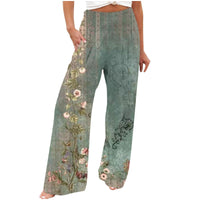 Damenhose mit Blumenmuster, grün, weit geschnitten, lässig, Sommermode, Boho-Stil.