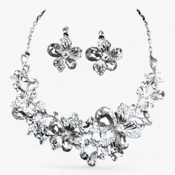 Silberne Blumen-Halskette und Ohrringe Set, funkelnd, eleganter Schmuck für Damen.