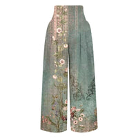 Weite Damenhose mit floralem Muster, blau-grün, Vintage-Stil, elegant, modisch.