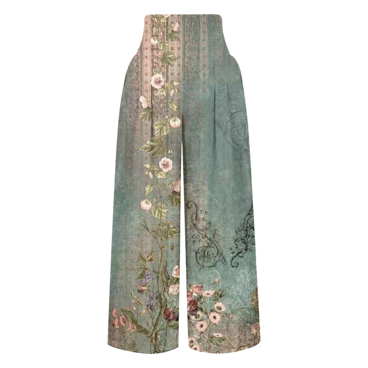 Weite Damenhose mit floralem Muster, blau-grün, Vintage-Stil, elegant, modisch.