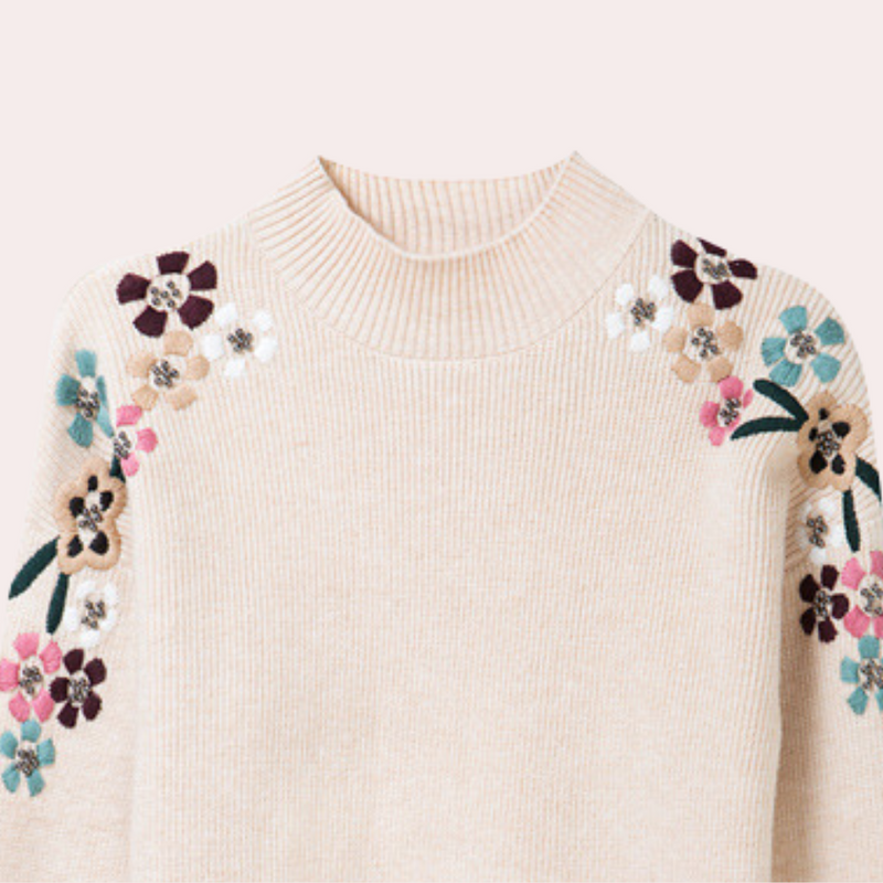 Beiger Pullover mit floralen Stickereien, Damenmode, Strick, Blumenmuster, modisch, elegant.