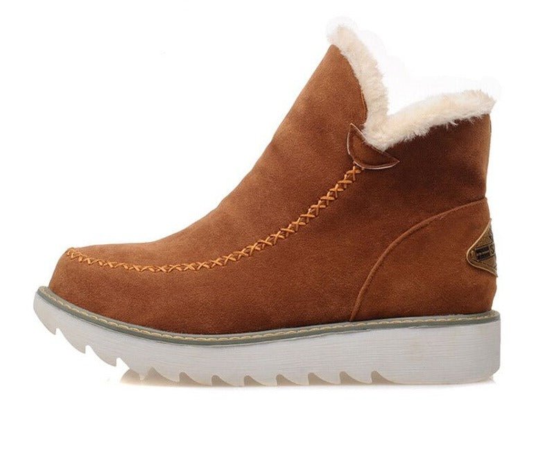 Braune Damen-Halbstiefel aus Wildleder mit weißem Kunstfellfutter und rutschfester Sohle.