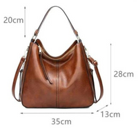 Braune Lederhandtasche, 35x28x13 cm, Damenmode, Schulterriemen, elegant, alltagstauglich.