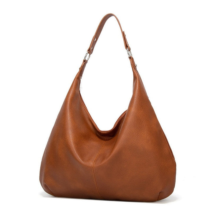 Braune Lederhandtasche, Hobo-Stil, Damenmode, elegantes Design, Schultertasche, Accessoire.