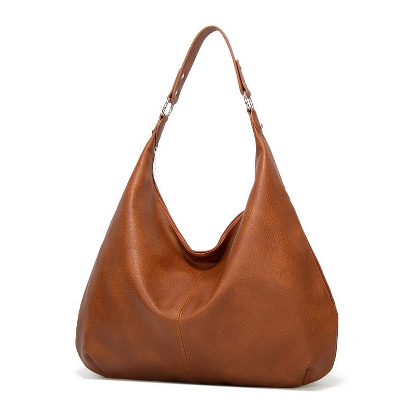 Braune Lederhandtasche, Hobo-Stil, Damenmode, elegantes Design, Schultertasche, Accessoire.