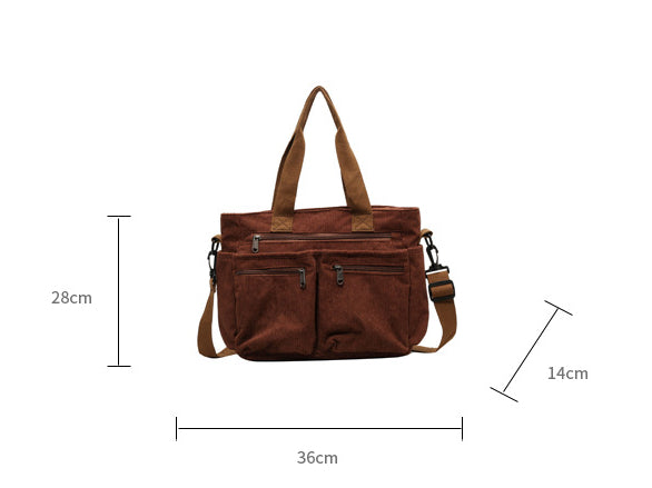 Braune Umhängetasche aus Canvas mit Reißverschlusstaschen, 36x28x14 cm, verstellbarer Gurt.