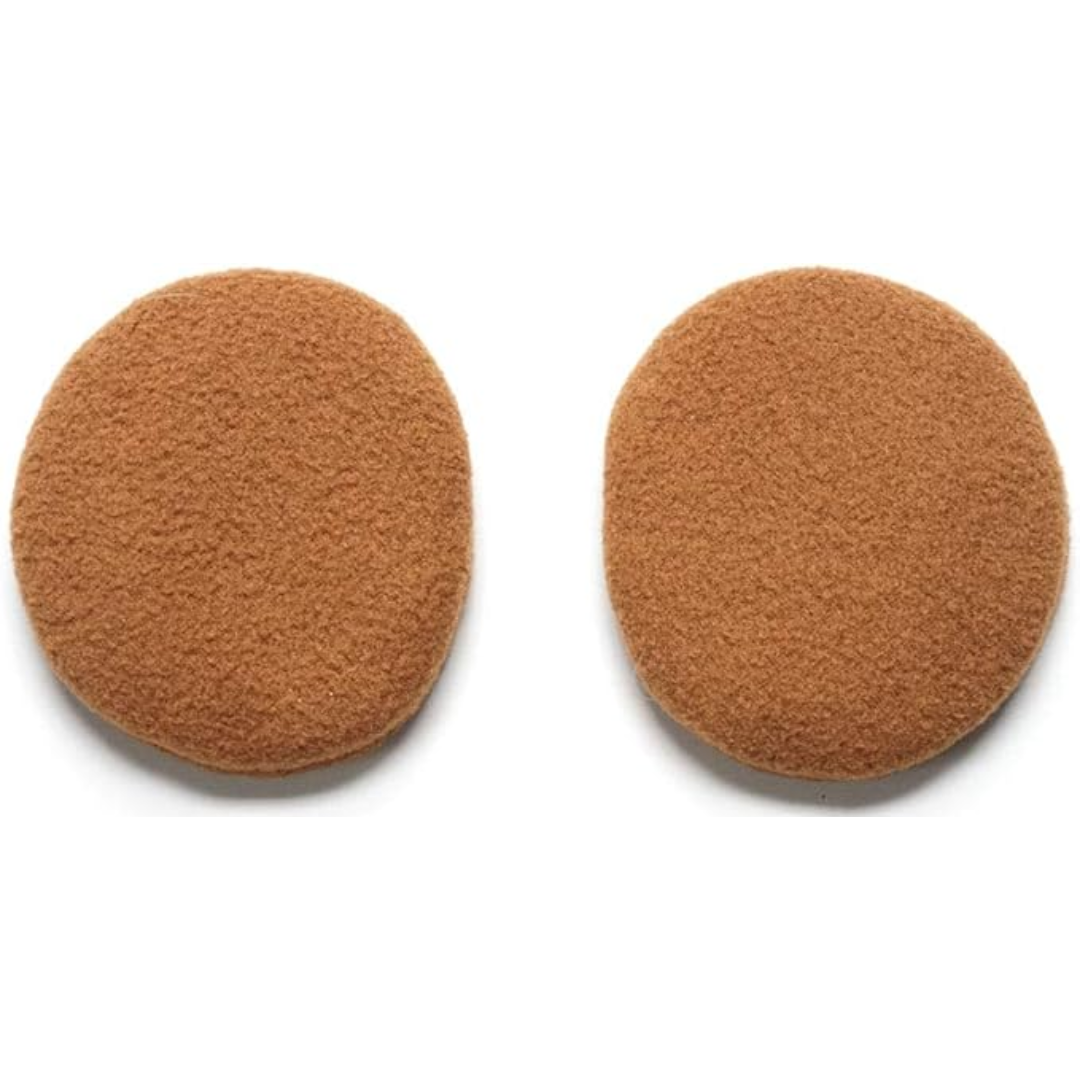 Zwei runde, braune Make-up-Schwämme aus weichem Material für gleichmäßiges Auftragen.