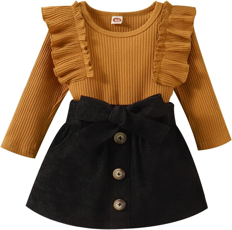 Braunes Rüschen-Kleid für Mädchen mit schwarzem Rock und Knöpfen, festlich, elegant.