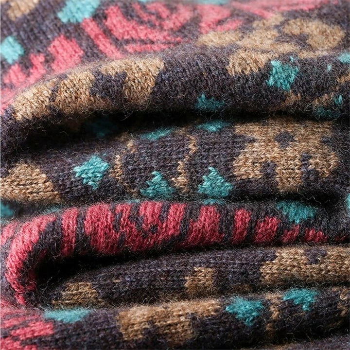 Brauner Jacquard-Strickstoff mit buntem Blumenmuster, ideal für Herbst-Winter-Mode.