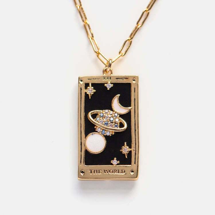Goldene Tarot-Halskette mit Planeten-Design, schwarzer Hintergrund, Schmuck für Damen.