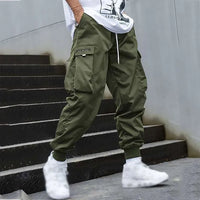 Grüne Herren-Cargo-Hose, Hip-Hop-Stil, mit Taschen, Streetwear, Jogger, urbaner Look.
