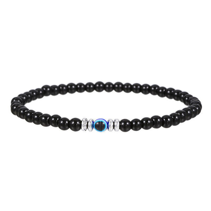 Schwarzes Perlenarmband mit blauer Perle und silbernen Akzenten, Schmuck für Herren und Damen.