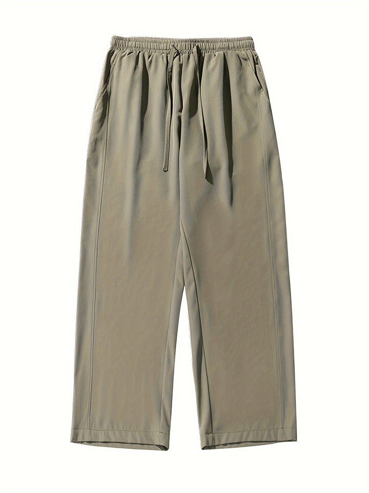 Beige Damenhose mit elastischem Bund, Kordelzug, aus Baumwolle, lässiger Stil, bequem.