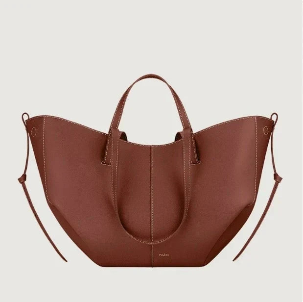 Cognacfarbene Damenledertasche, elegant, geräumig, mit Henkeln, modisches Accessoire.