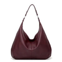 Bordeauxrote Lederhandtasche, Hobo-Stil, Damenmode, elegantes Accessoire, Schultertasche.