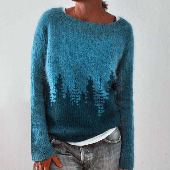 Damenpullover blau mit Waldmotiv, Strick, langärmelig, lässig, Herbstmode, gemütlich.