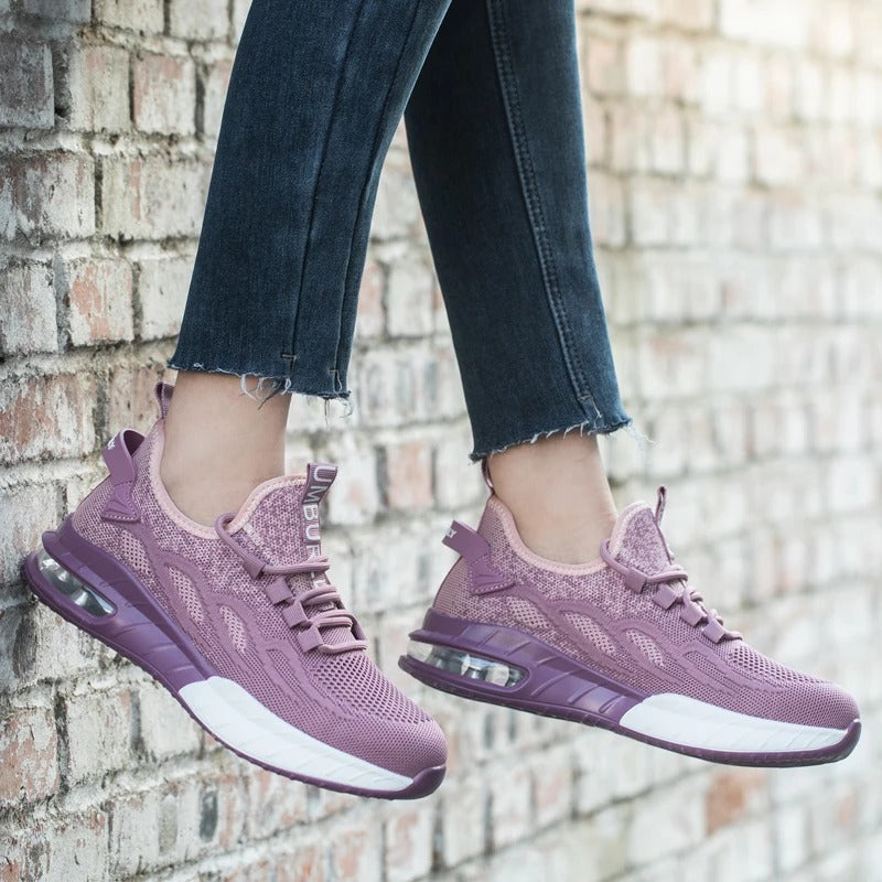 Lila Damen-Sneaker mit Luftpolstersohle, atmungsaktiv, ideal für Freizeit und Sport.