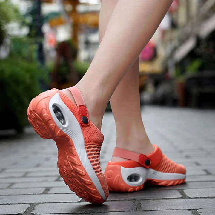 Damen-Sneaker in Orange, atmungsaktiv, rutschfest, ideal für Outdoor-Aktivitäten.