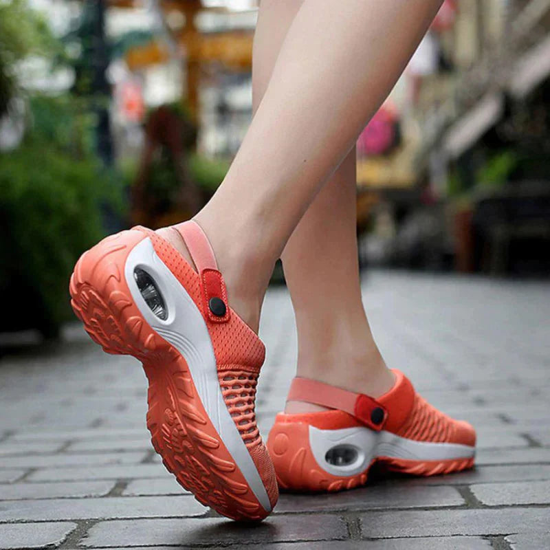 Damen-Sneaker in Orange, atmungsaktiv, rutschfest, ideal für Outdoor-Aktivitäten.