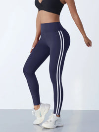 Damen Sportleggings mit weißen Streifen, dunkelblau, elastisch, ideal für Fitness und Yoga.