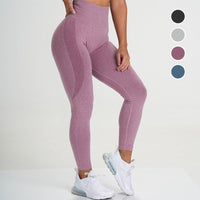 Frau in rosa nahtlosen Leggings, Sportbekleidung, hohe Taille, Fitnessmode.