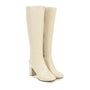 Beige Damenstiefel mit Blockabsatz, elegantes Design, weiches Material, Reißverschluss.