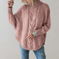 Frau in rosa Strickpullover mit Zopfmuster, lässig, modisch, Herbstmode, Damenbekleidung.