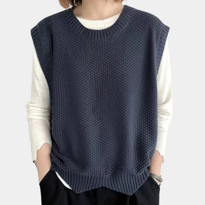 Dunkelblauer Strickpullover ärmellos Damenmode elegant Baumwolle lässig.