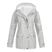 Damen Regenjacke, hellgrau, wasserdicht, Kapuze, Outdoor-Bekleidung, modisch, funktional.