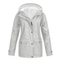 Damen Regenjacke, hellgrau, wasserdicht, Kapuze, Outdoor-Bekleidung, modisch, funktional.