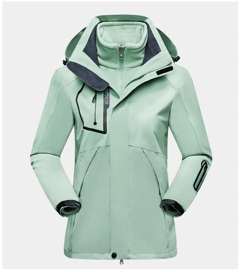 Damen Outdoorjacke, mintgrün, wasserdicht, mit Kapuze, Reißverschluss, winddicht, atmungsaktiv.