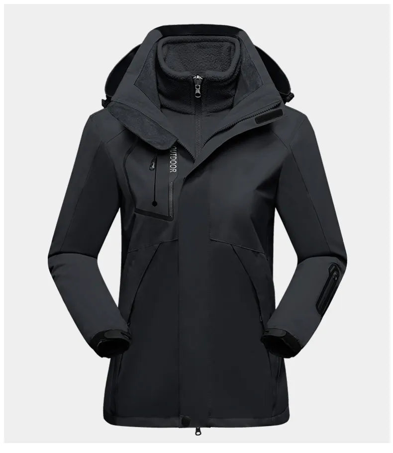 Schwarze wasserdichte Outdoor-Jacke mit Kapuze, Reißverschluss und Taschen für Damen.