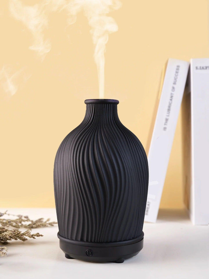Schwarzer Keramik-Diffuser mit Dampf, modernes Design, Aromatherapie, Wohnzimmer-Dekoration.