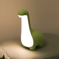 Grüne Dinosaurier-Nachtlampe aus Silikon mit LED für Kinderzimmerbeleuchtung.