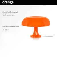 Orangefarbene Tischlampe aus Polycarbonat, modernes Design, ideal für 5-10m² Räume.
