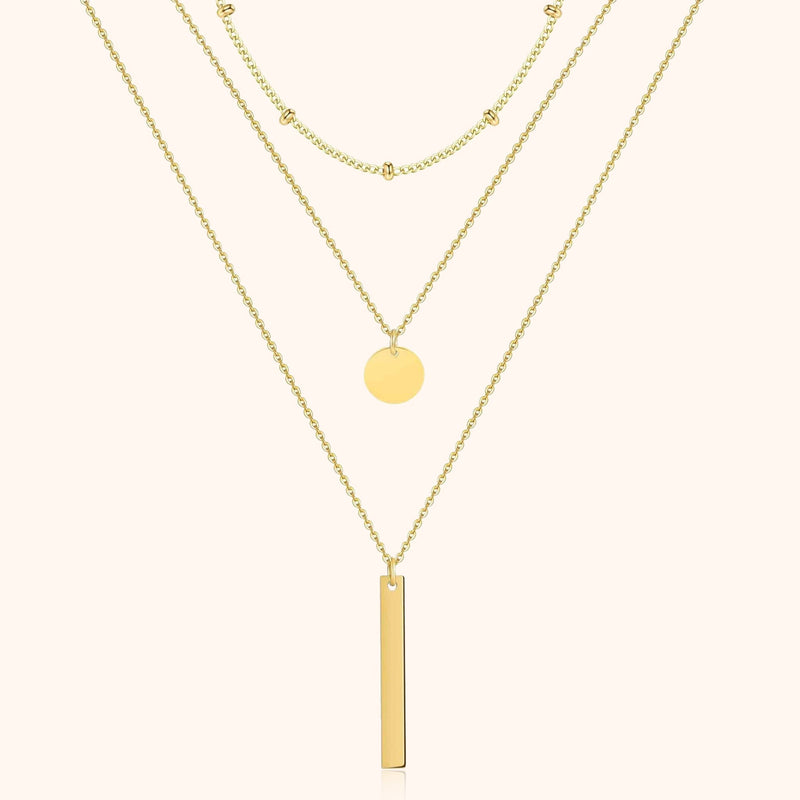 Dreifache goldene Halskette mit Anhängern, modisches Schmuckstück für Damen.