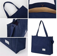 Dunkelblaue Cord-Tasche, geräumig, mit Tragegriffen, ideal für Alltag und Einkäufe.