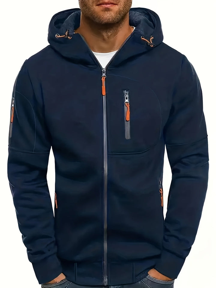 Dunkelblaue Herren-Softshelljacke mit Kapuze, Reißverschlusstaschen, Outdoor-Bekleidung.