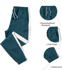 Dunkelgrüne Jogginghose mit Kordelzug, Seitentasche, elastischem Bund und Beinabschlüssen.