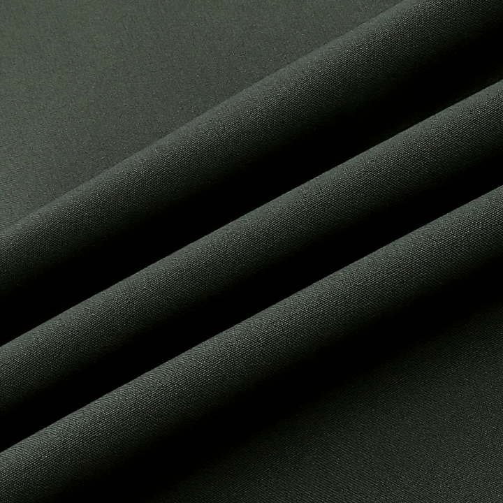 Dunkelgrüner Stoff, Nahaufnahme, Textur, weiches Material, Mode, Bekleidung, Stoffdesign.