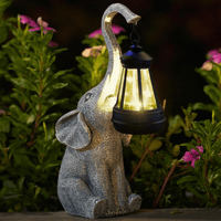Gartenfigur Elefant mit Solarlaterne, grauer Steinoptik, LED-Beleuchtung, dekorative Außenleuchte
