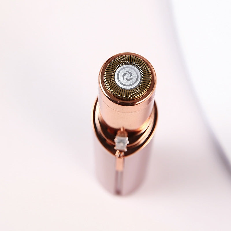 Damenrasierer in Roségold, tragbar, elektrisch, für Gesichtshaarentfernung, stilvolles Design.