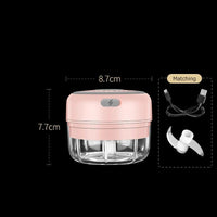 Rosa elektrischer Zerkleinerer, USB-aufladbar, 8.7x7.7cm, mit Klinge und Ladekabel.