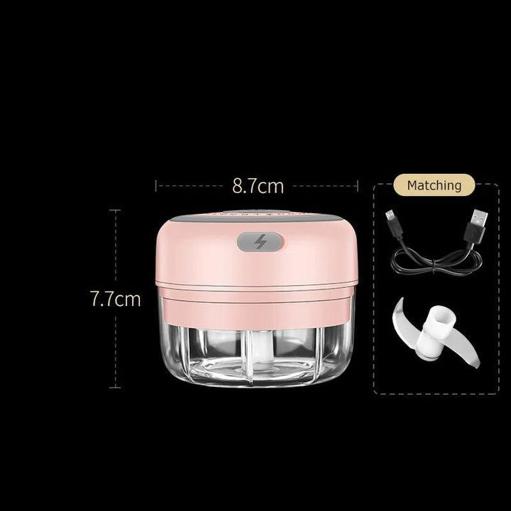 Rosa elektrischer Zerkleinerer, USB-aufladbar, 8.7x7.7cm, mit Klinge und Ladekabel.