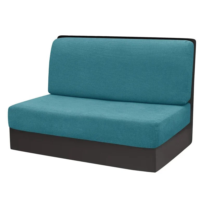 Türkises Sofa ohne Armlehnen, modernes Design, gepolstert, ideal für Wohnzimmer oder Büro.
