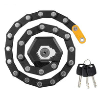 Schwarzes faltbares Fahrradschloss mit Schlüsseln, robustes Design, Diebstahlschutz.